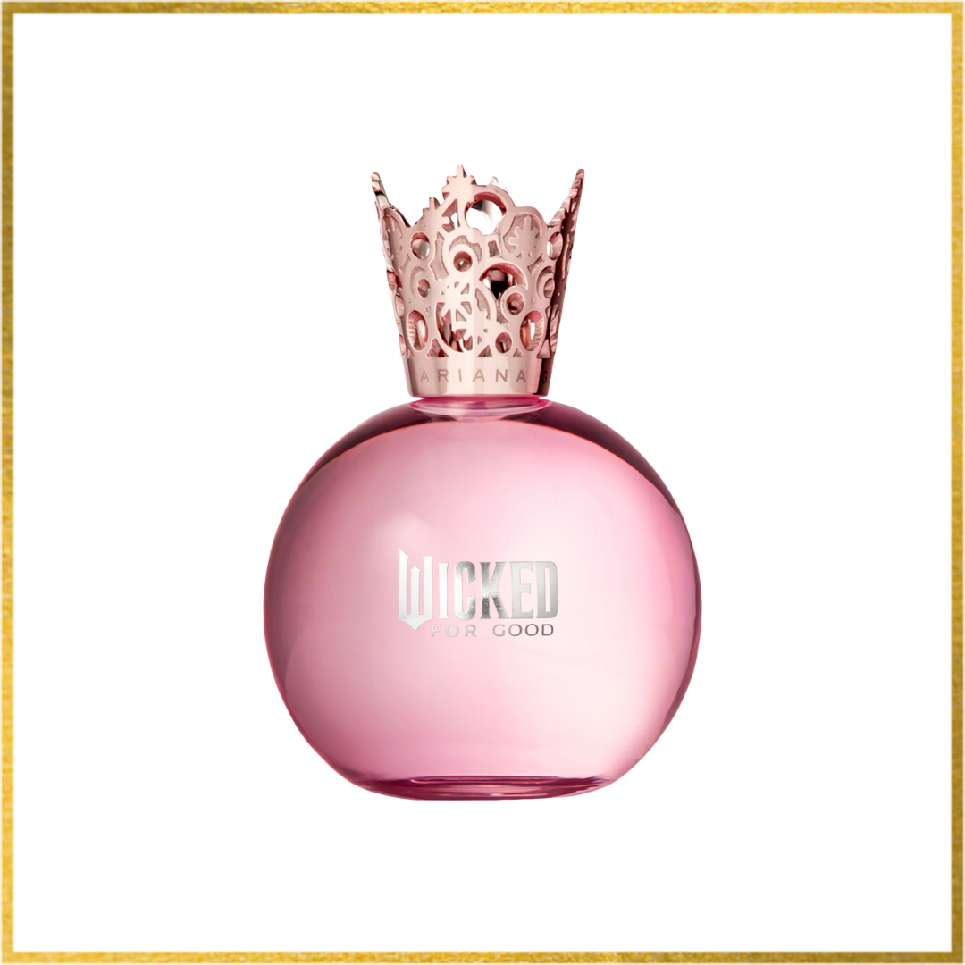 Pink perfume bottle with decorative cap on a white background. Ariana grande Wicked for good Glinda bubbly pink sample