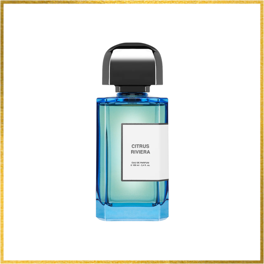 Blue perfume bottle labeled 'Citrus Riviera' on a white background