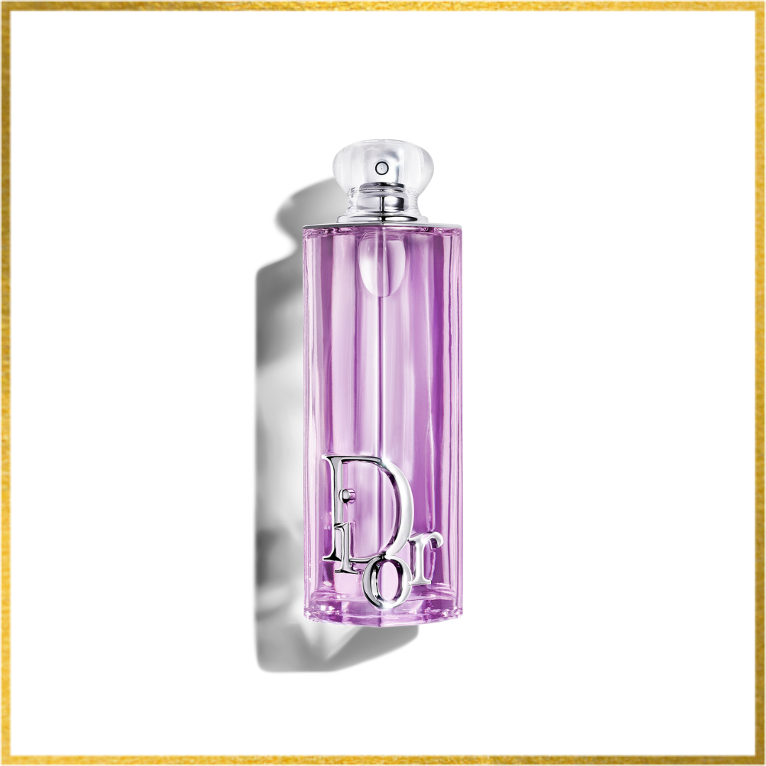 Purple Dior perfume bottle on a white background