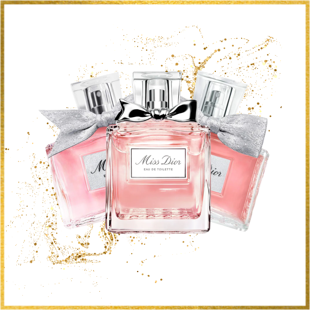 Pink Dior perfume bottles with silver bows on a white background