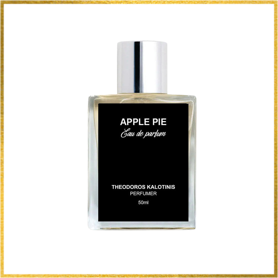 Perfume bottle labeled 'Apple Pie' by Theodoros Kalotinis on a white background